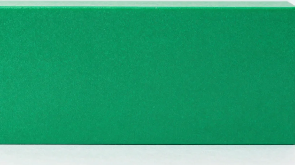 Solid color block in vivid accent green (#00C9A7).